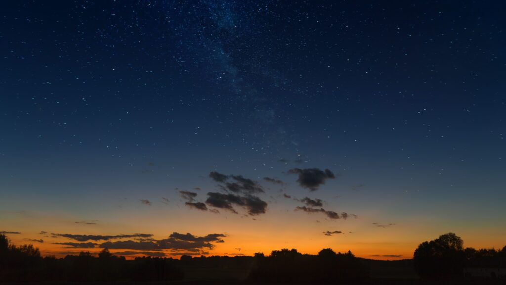 Why is the sky darker near the horizon?